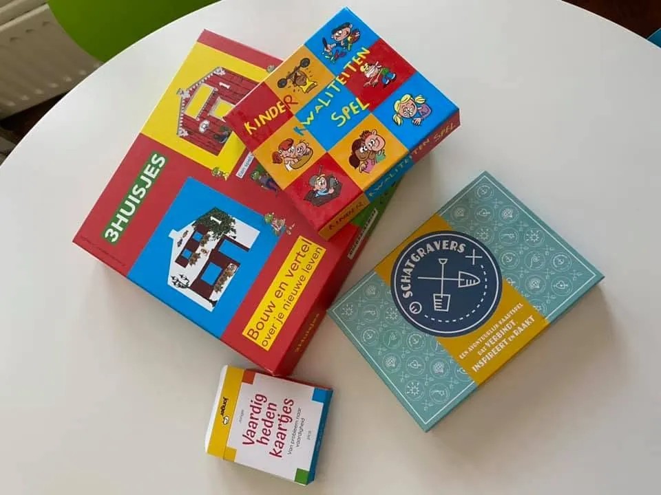Spellen die tijdens de sessies worden gebruikt, waaronder het kinderkwaliteitenspel